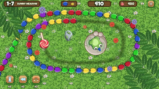 Zone 1, Sunny Meadow: the chain loops around the frog on its stone in bright green grass.