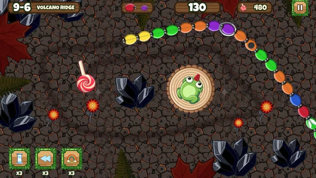 Zone 9, Volcano Ridge: sparks fly over black rock and dark crystals as the chain burns past.